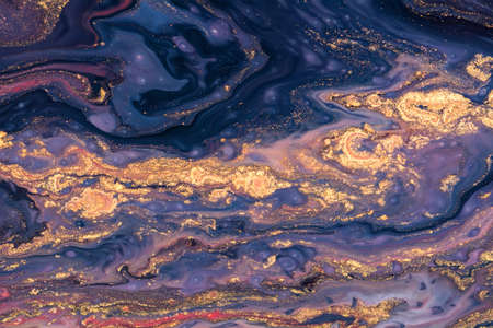 Luxury fluid art painting background. Spilled purple, blue and gold acrylic paint. Liquid marble...