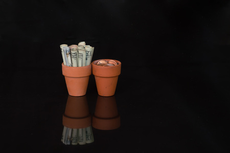 Money in terracotta potの写真素材