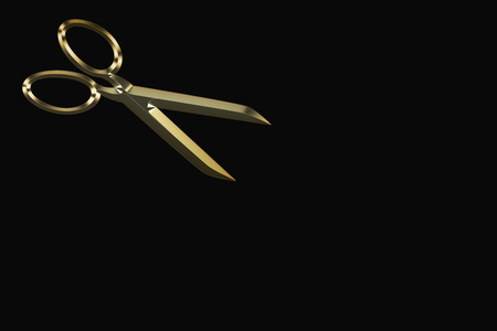 Golden scissors on a black backgroundの写真素材