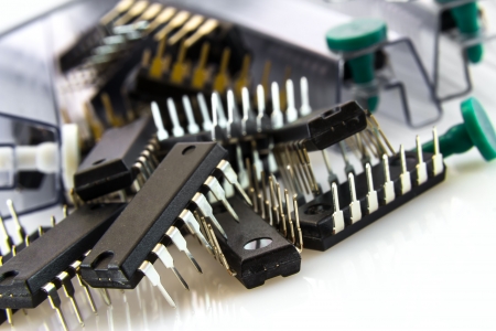 binary logic ICs spilled out of bushings at low yellow flash, NAND and NOR
