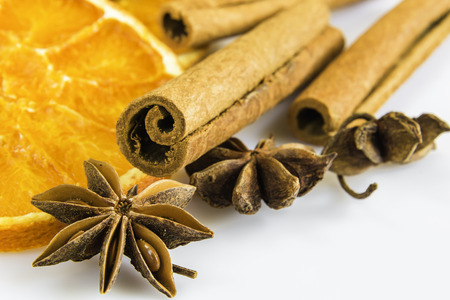 a few anise stars and cassia cinnamon with dried orange rings