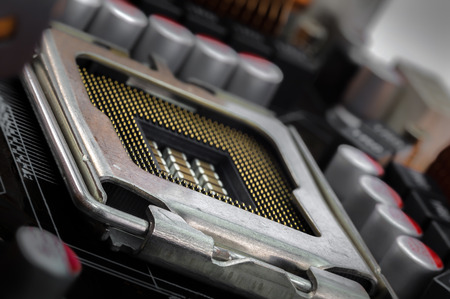 empty CPU socket between the capacitors and coils in the supply part on PCB motherboard