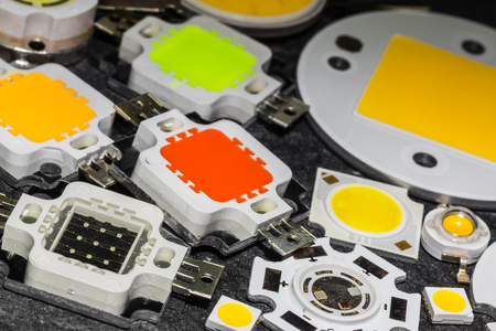 various powerful color 10W LED chips cooled solid aluminum and a few smaller chips of various shapeの写真素材