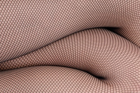 mesh stockings are on female legs の写真素材