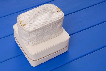couple of white leather boxes with cosmeticの写真素材
