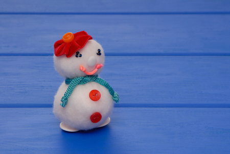female snowman on  New Year's post card, snowmans on Christmas card, handmade snowmans,  syntepon New-Year tree decorations, New Year's creative backgroundの写真素材