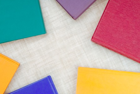 books are on the table,  empty space, texturing backgrounds, framework is from  multicolor books,の写真素材