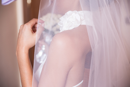 Detail of a Bride getting ready for the wedding day.の写真素材