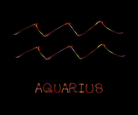 Zodiac sign from led light on black background.の写真素材
