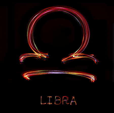 Zodiac sign from led light on black background.の写真素材