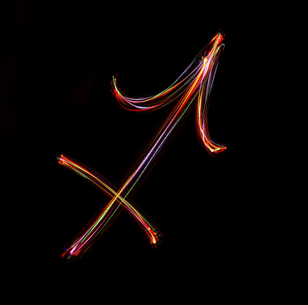 Zodiac sign from led light on black background.の写真素材