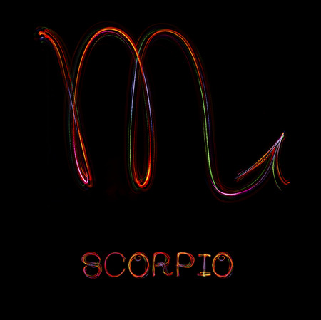 Zodiac sign from led light on black background.の写真素材