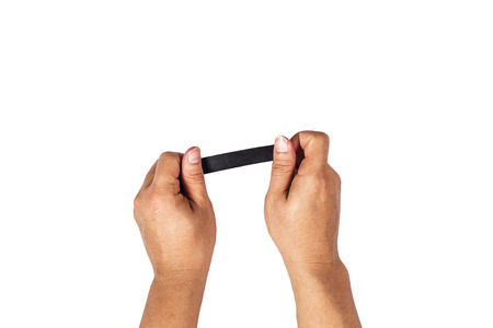 The concept of hands is about to black taped to close on the white background.の写真素材