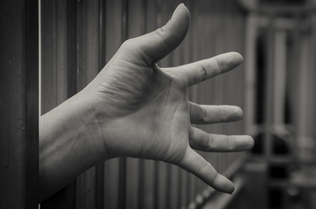 Hand in jailの写真素材