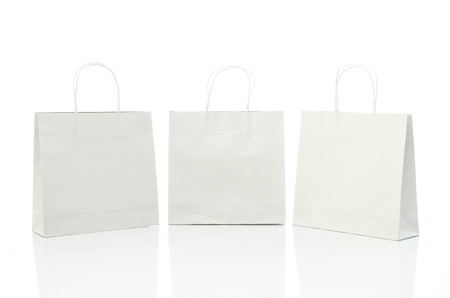 White shopping bag on white background isolatedの写真素材