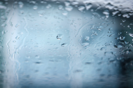Blue water drops background with copy space