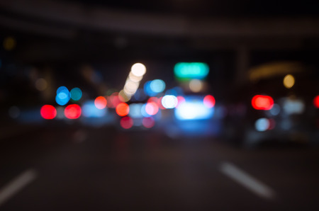 Blurred Defocused Lights of Traffic on a City Road at Nightの写真素材