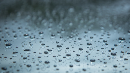 Water drops on mirror background