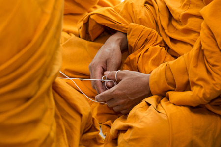 pray, Put the palms of the hands together in salute , monks, thailandの写真素材