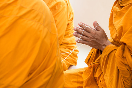 pray, Put the palms of the hands together in salute , monks, thailandの写真素材