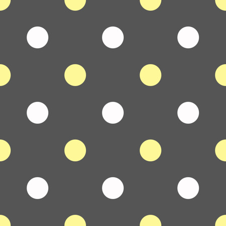 White and yellow polka dots on grey backgroundの写真素材