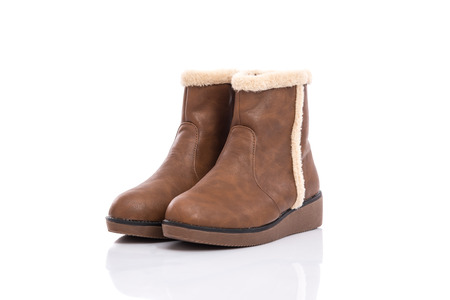 Brown woman boots isolated on white backgroundの写真素材