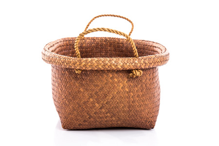 Empty wicker basket on white background,isolatedの写真素材