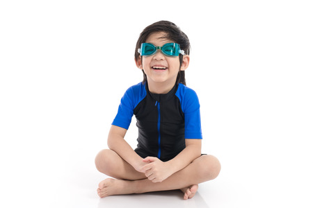 Cute Asian child in swimsuit on white background isolatedの写真素材