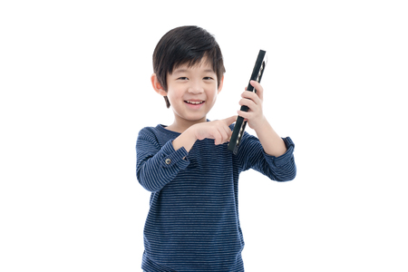 Cute Asian child holding Soroban abacus on white background isolatedの写真素材