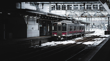 Akita,Japan, 31 January  2018:Local train on a snowy train station in winterのeditorial素材