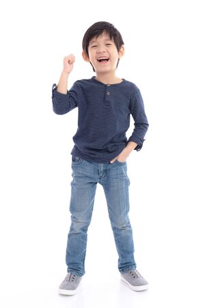 Cute Asian child showing winner sign on white background isolatedの写真素材