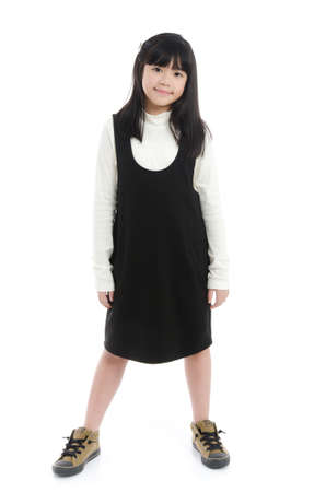 Beautiful asian girl standing on white background isolatedの写真素材