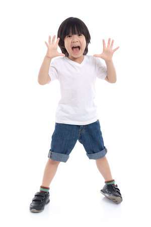 Cute Asian child  is suprise and so happy about it on white background isolatedの写真素材