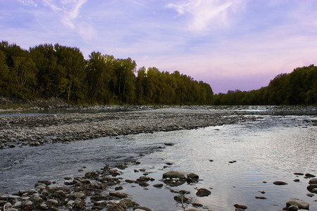 mountain river cristll clear water and on sunny day in the alpsの写真素材