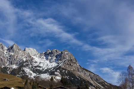 Panoramic view of idyllic winter wonderland with mountain tops in the Alps on a sunny day with blue sky, Muehlbach, Hochkoenig skiing resort, Salzburger Land, Austriaの写真素材