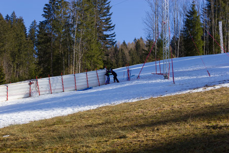 HINTERSTODER,  AUSTRIA - February 22, 2016: Countdown, The Austrian team is working at full speed to complete the world cup slope and the finish area for competitions on 26 to 28 February 2016 Hinterstoder.のeditorial素材