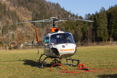 HINTERSTODER,  AUSTRIA - February 22, 2016: this helicopter transported heavy equipment up to the mountain, to complete the world cup piste and the finish area for competitions on 26 to 28 February 2016 hinterstoder.のeditorial素材
