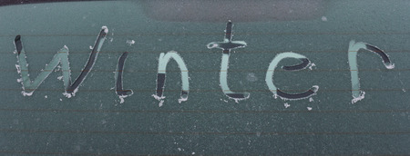 Handwritten inscription Winter on the Ice car rear glass windowの写真素材