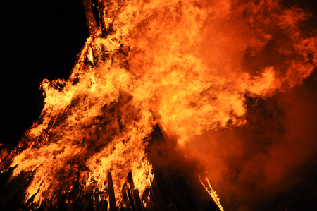 Fire flames on black background, hellfire.の写真素材