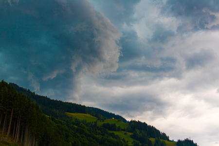 dark storm clouds before rain, in the eveningの写真素材