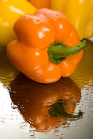 Fresh pepper and drops of waterの写真素材