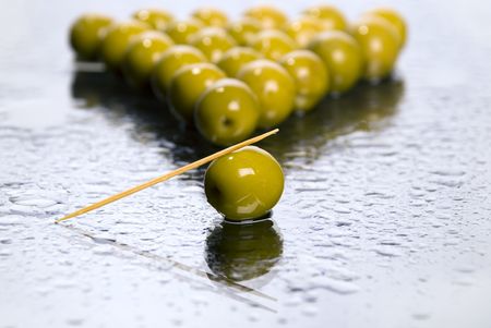 Fresh olives and drops of water
