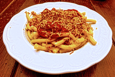 macaroni with bolognese sauce sprinkled with ricotta salata: delicious