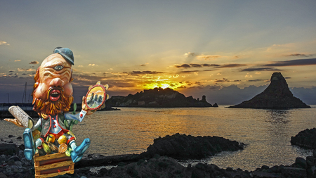 Polifemo waits for dawn at Acitrezzaの写真素材