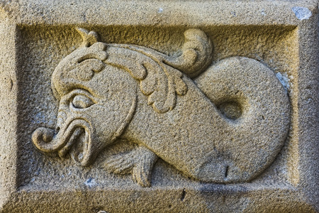 detail of a bas-relief on stoneの写真素材
