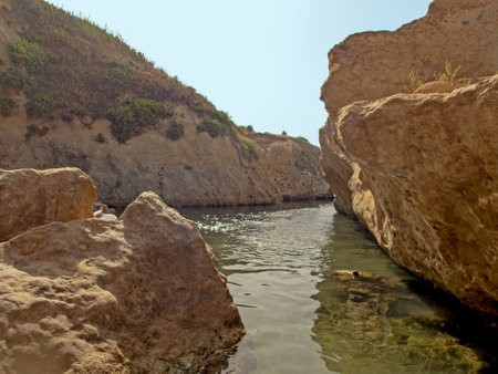 The coast of Punta del Castelluccio in the Ionian Seaの写真素材