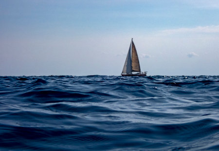 Sailboat in the blue seaの写真素材