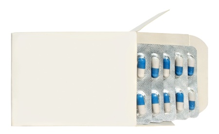Pills in a box on a white background.