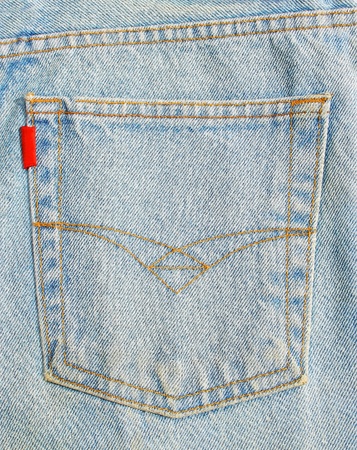 Back pocket of blue jeans.