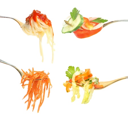 Food on a fork on a white background.の写真素材